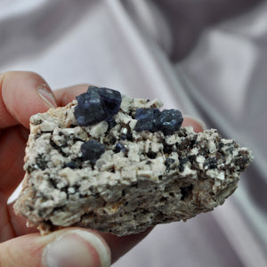 Purple Fluorite in Feldspar with Clevelandite